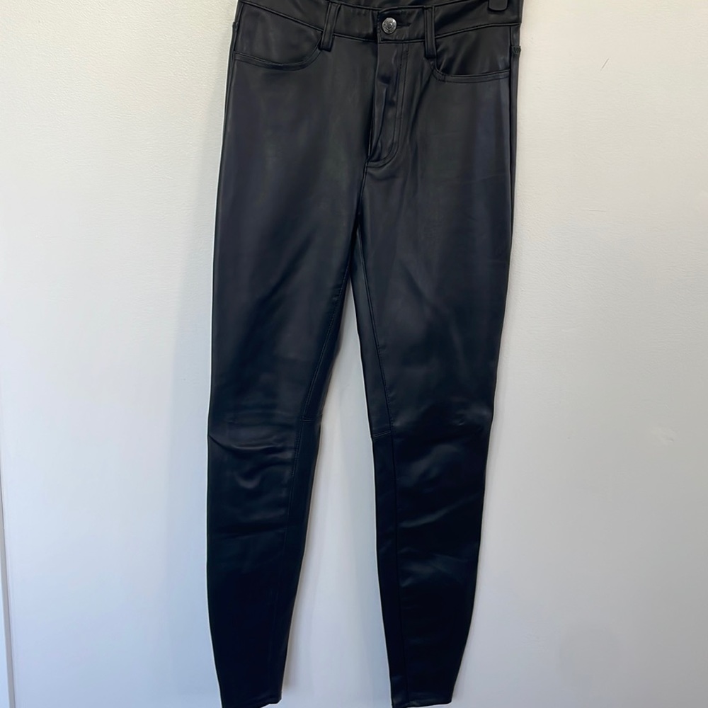 Free People high waist black faux leather skinny pants. Size 24